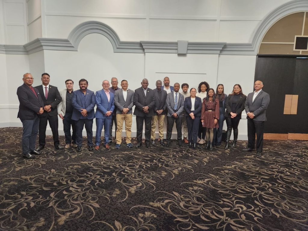 Pix shows Energy Minister Vickram Bharrat and Home Affairs Minister Robeson Benn at Energy Conference in Toronto. They interacted with the Guyanese diaspora.