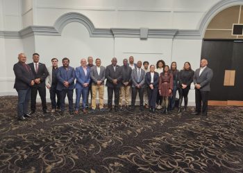 Pix shows Energy Minister Vickram Bharrat and Home Affairs Minister Robeson Benn at Energy Conference in Toronto. They interacted with the Guyanese diaspora.