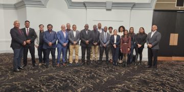 Pix shows Energy Minister Vickram Bharrat and Home Affairs Minister Robeson Benn at Energy Conference in Toronto. They interacted with the Guyanese diaspora.