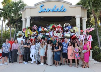 Radio Personalities are shown with the Junkanoo group at a farewell event at Sandals Emerald Bay, Exuma