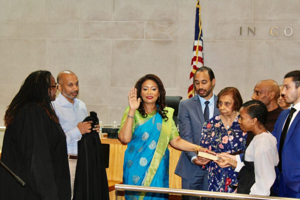 Judge Andrea Ogle being sworn as Judge of the Civil Court of the City of New York