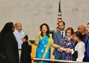 Judge Andrea Ogle being sworn as Judge of the Civil Court of the City of New York