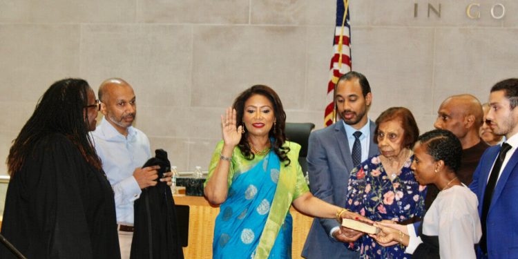 Judge Andrea Ogle being sworn as Judge of the Civil Court of the City of New York