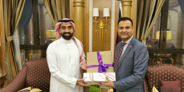 Caribbean Airlines’ Chairman Mr. S. Ronnie Mohammed (right) presents Mr Rashed Alshammair- Vice President of Commercial from Saudi Arabia's Air Connectivity Program (ACP) with a gift after their strategic meeting.