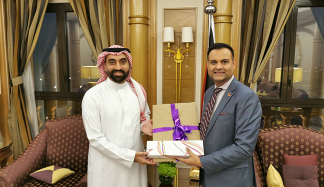 Caribbean Airlines’ Chairman Mr. S. Ronnie Mohammed (right) presents Mr Rashed Alshammair- Vice President of Commercial from Saudi Arabia's Air Connectivity Program (ACP) with a gift after their strategic meeting.