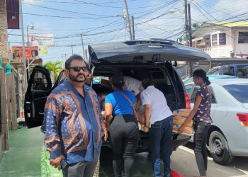 Dave Narine distributes bread and other necessities to depressed communities in Guyana