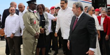 Venezuela's President Nicolas Maduro is received by the St. Vincent and the Grenadines' Prime Minister Ralph Gonsalves before a meeting with Guyanese President Irfaan Ali amid tensions over a border dispute, in Kingstown, St. Vincent and the Grenadines December 14, 2023. Miraflores Palace/Handout via REUTERS ATTENTION EDITOR - THIS IMAGE HAS BEEN SUPPLIED BY A THIRD PARTY
