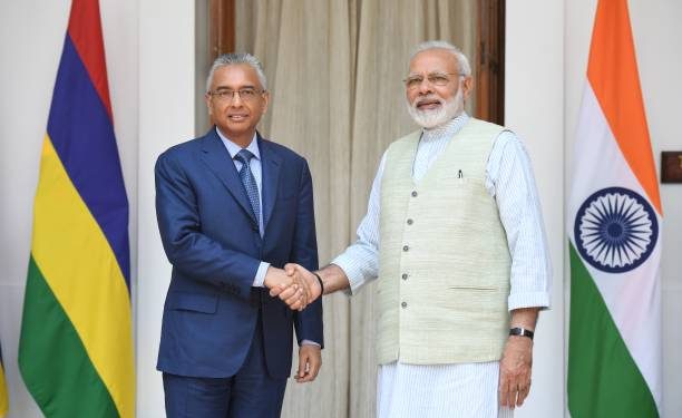 Mauritius' Prime Minister Pravind Kumar Jugnauth (L) shakes hands with Indian Prime Minister Narendra Modi prior to a meeting and an agreement signing in New Delhi on May 27, 2017. - Jugnauth is on three day state visit to India. (Photo by PRAKASH SINGH / AFP) (Photo by PRAKASH SINGH/AFP via Getty Images)