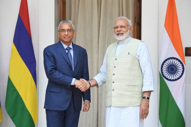 Mauritius' Prime Minister Pravind Kumar Jugnauth (L) shakes hands with Indian Prime Minister Narendra Modi prior to a meeting and an agreement signing in New Delhi on May 27, 2017. - Jugnauth is on three day state visit to India. (Photo by PRAKASH SINGH / AFP) (Photo by PRAKASH SINGH/AFP via Getty Images)