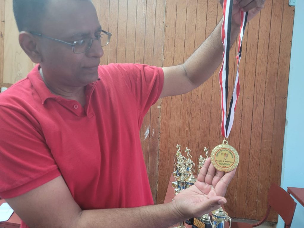 Ramcharan displays a medal