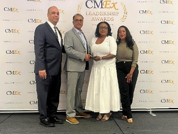 Minister of Tourism, the Hon Josephine Connolly presents Mr. Kashmie Ali with his CMEx Leadership Award with CMEx founder Mr. Bevan Springer and event host Ms. Vanessa James