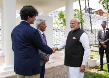 Indian PM Modi Greeting Jaden Ramsaran. Ashook Ramsaran standing in center.