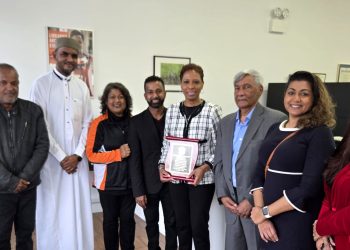 Photo From left to right: Rhonda Binda, Faiuze Ali, Imam Safraz Bacchus, Jeany Persaud, Richard David, Speaker Adrienne Adams, Ashook Ramsaran, Dr. Nicole Bissessar, and Lakshmee Singh.