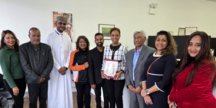 Photo From left to right: Rhonda Binda, Faiuze Ali, Imam Safraz Bacchus, Jeany Persaud, Richard David, Speaker Adrienne Adams, Ashook Ramsaran, Dr. Nicole Bissessar, and Lakshmee Singh.